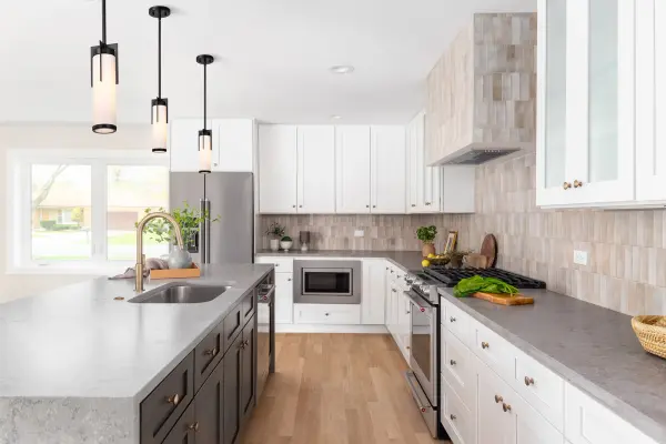 The Roselle Mini Pendant offers a refined balance of transitional and contemporary design with its matte black finish and white glass shade. Perfect for kitchen islands, bathrooms, or entryways, it delivers soft, diffused lighting in a compact form. - alternate view