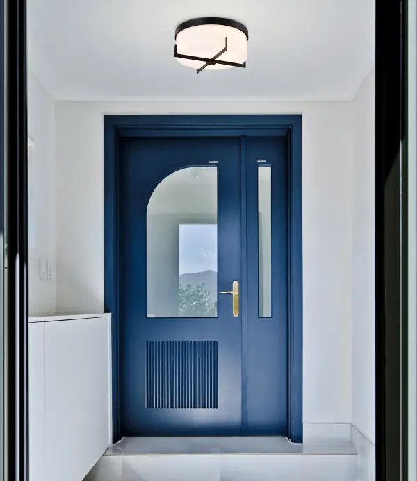 The Roselle flush mount combines transitional charm with contemporary style in a compact 15-inch profile. Its matte black finish and white glass shade deliver soft, ambient lighting ideal for low-ceiling spaces. - alternate view