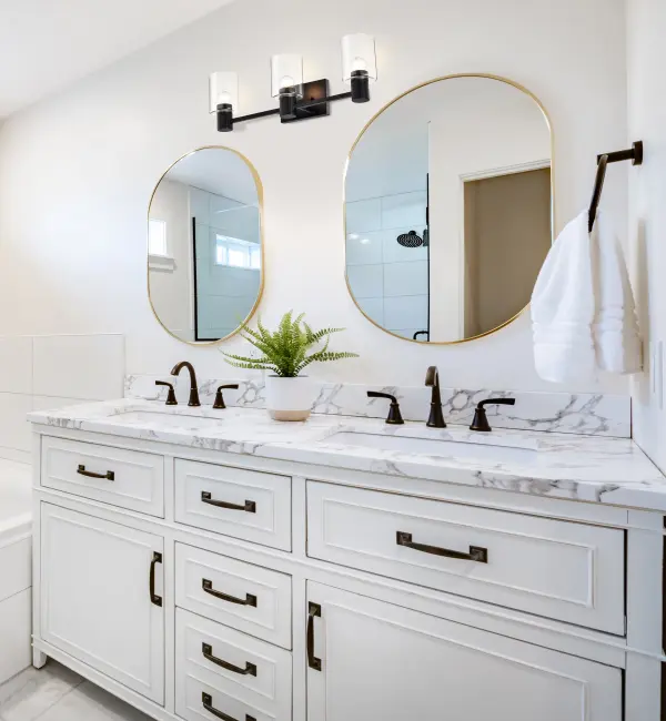 The Clarksville 3-Light Vanity combines clean modern lines with timeless matte black finish and clear glass shades. Perfect for contemporary bathrooms seeking sophisticated simplicity without sacrificing illumination quality. - alternate view