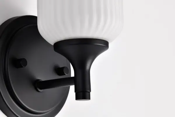 Solara 1-Light Wall Sconce in Matte Black with Frosted Ribbed Glass - Image 17