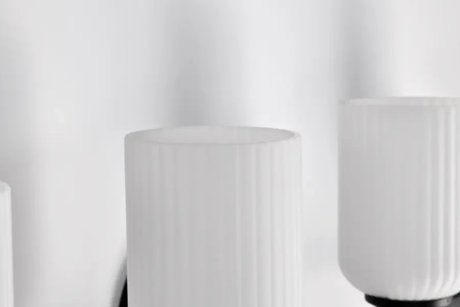 Solara 4-Light Vanity in Matte Black with Frosted Ribbed Glass - Image 11