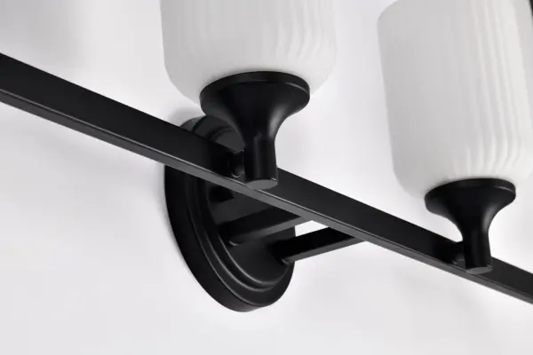 Solara 4-Light Vanity in Matte Black with Frosted Ribbed Glass - Image 12