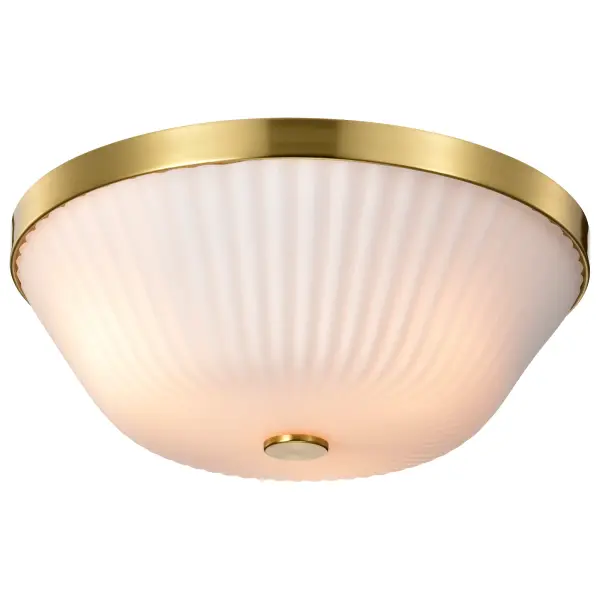 The Royale flush mount brings Art Deco elegance to low-ceiling spaces with its burnished brass finish and textured ribbed white glass. The pleated glass diffuses light beautifully while adding visual interest. - alternate view