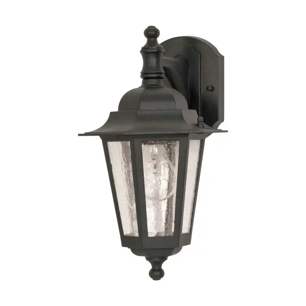 The Cornerstone wall lantern delivers classic outdoor lighting with clear seeded glass and a durable black finish. At 13 inches, it's perfectly sized for entryways, porches, and patios without overwhelming smaller spaces.