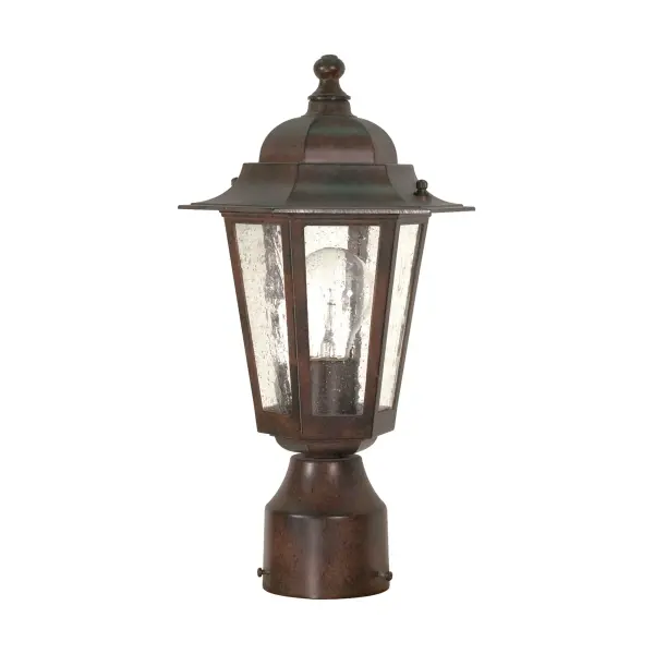 The Cornerstone post lantern combines traditional elegance with practical outdoor lighting. Its old bronze finish and clear seeded glass create a sophisticated first impression while providing reliable illumination for pathways and entryways.