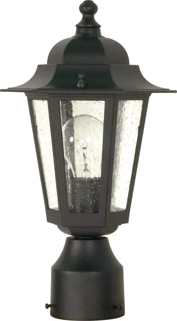 The Cornerstone post lantern combines timeless design with practical outdoor lighting. Its textured black finish and clear seeded glass create an elegant first impression while providing reliable illumination for pathways and entryways.