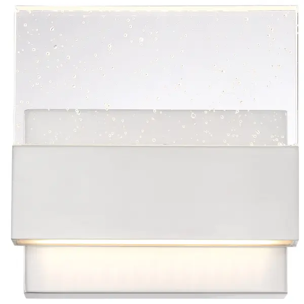 The Ellusion LED wall sconce combines contemporary styling with practical LED technology. Its polished nickel finish and seeded glass shade create visual interest while delivering 675 lumens of warm white light for 30,000 hours.