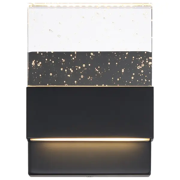 The Ellusion LED wall sconce combines contemporary design with practical LED efficiency. Its matte black finish and seeded glass shade create visual interest while delivering 675 lumens of warm 3000K light for 30,000 hours.