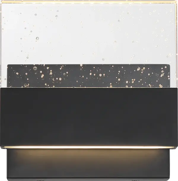 The Ellusion LED wall sconce combines contemporary styling with practical LED efficiency. Its matte black finish and seeded glass shade create visual interest while delivering 675 lumens of warm 3000K light for 30,000 hours.