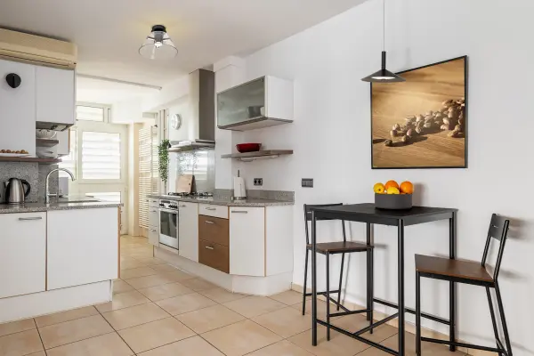 The Edmond semi-flush mount combines transitional elegance with modern LED efficiency. Its 14-inch profile and matte black finish make it ideal for smaller spaces needing stylish, low-profile lighting. - alternate view