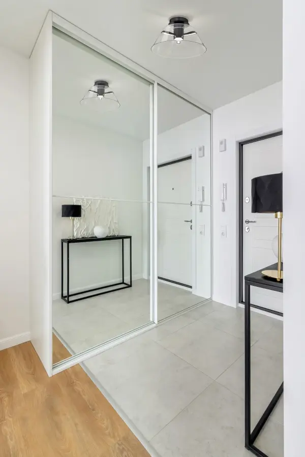 The Edmond semi-flush mount combines sophisticated matte black finish with clear glass shades, delivering 1944 lumens of warm 3000K LED light. Perfect for spaces with lower ceilings requiring both style and function. - alternate view