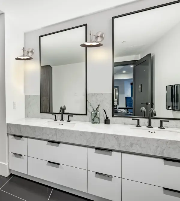 The Corrine LED wall sconce combines minimalist design with practical functionality, featuring selectable color temperatures (3000K-5000K) and energy-efficient LED technology. Perfect for modern bathrooms and hallways. - alternate view