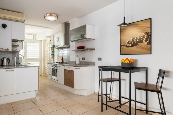 The Kendall flush mount combines refined transitional design with modern LED technology. Its burnished brass finish and alabaster glass create a warm, sophisticated glow perfect for low-ceiling spaces. - alternate view