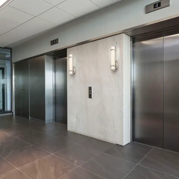 The Slice LED wall sconce delivers sophisticated modern lighting with integrated warm white LEDs. Its polished nickel finish and graceful design make it ideal for bathrooms, hallways, and entryways seeking elegant illumination. - alternate view