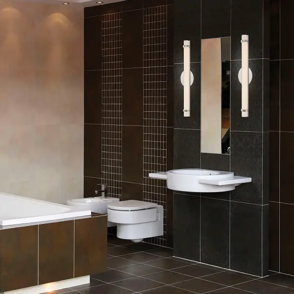 The Slice Double LED Wall Sconce combines modern elegance with practical LED technology. Its polished nickel finish and graceful design deliver 2080 lumens of warm white light, perfect for vanity lighting or ambient illumination. - alternate view