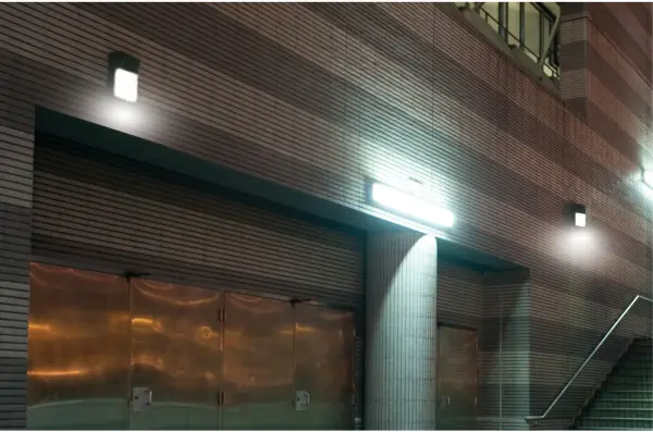 This 26W LED wall pack delivers 1691 lumens of bright 5000K daylight illumination, perfect for security and entrance lighting. Bronze finish complements various architectural styles while providing durable outdoor performance. - alternate view