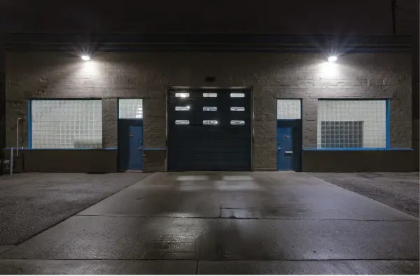 This IP65-rated LED area light delivers 2200 lumens of cool white 4000K illumination, perfect for building exteriors and outdoor spaces. Features an integrated photocell for automatic dusk-to-dawn operation and weather-resistant construction. - alternate view