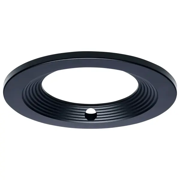 This 6-inch round trim accessory completes LED downlight installations with a sleek black finish and integrated emergency driver compatibility. Designed for commercial applications requiring code-compliant backup lighting.