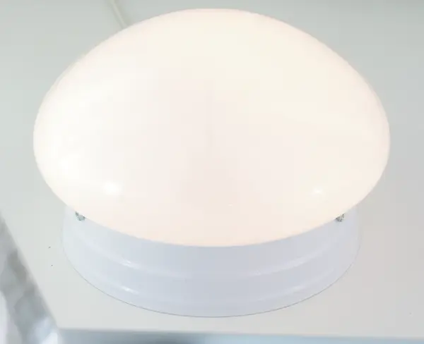 This 8-inch white mushroom flush mount delivers simple, functional lighting ideal for hallways, bathrooms, and closets. Its compact profile and clean white finish blend seamlessly into any space.