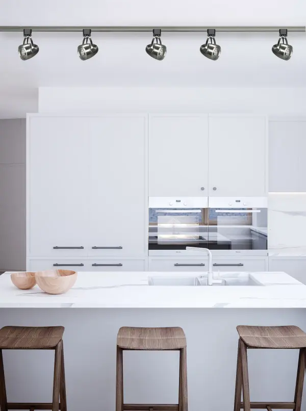 This 12W LED track head delivers precise accent lighting with a narrow 24-degree beam spread, perfect for highlighting artwork, architectural features, or retail displays. The sleek black finish and pinch-back design offer contemporary style with easy installation. - alternate view