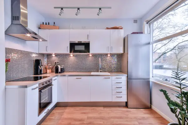 This 12-watt LED track head delivers warm white light with a focused 36-degree beam spread, perfect for highlighting artwork, architectural features, or retail displays. The brushed nickel finish adds contemporary elegance. - alternate view