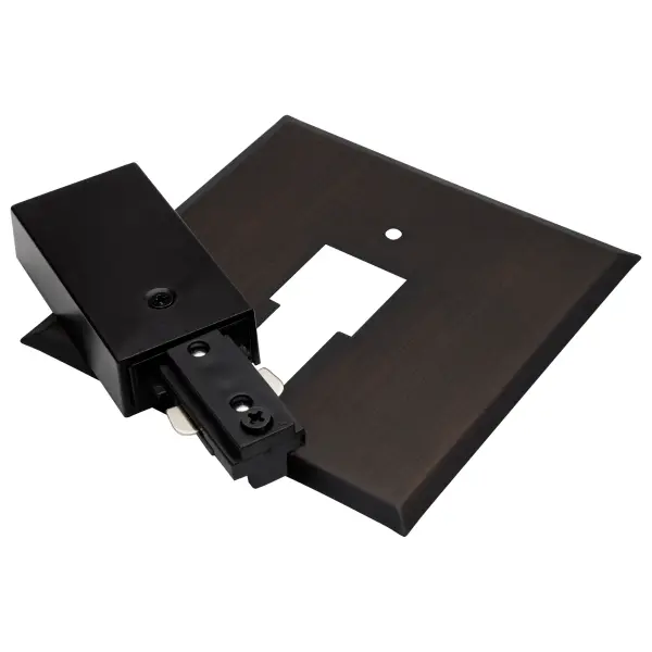 A durable reverse polarity canopy power feed designed for versatile track lighting installations. The brown finish provides a discreet connection point that maintains continuous power flow for reliable operation.