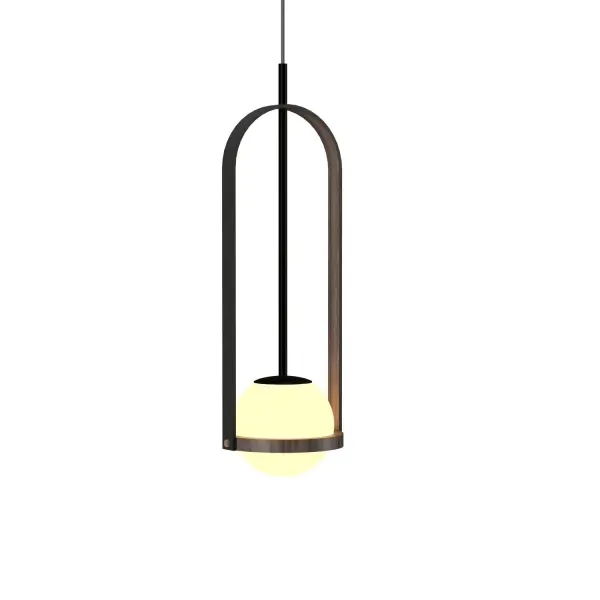 The Strap Pendant showcases beautiful American Walnut in a clean, modern silhouette. Its natural wood finish adds warmth and organic texture, making it ideal for contemporary interiors seeking a softer, more inviting aesthetic.