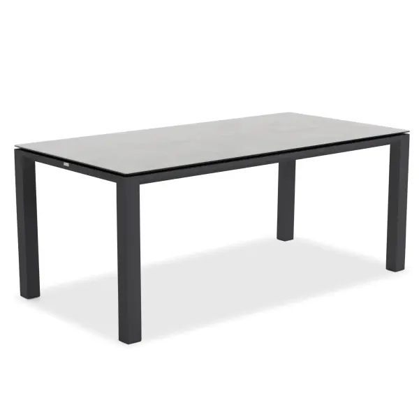 The Concept Dining Table combines contemporary design with exceptional durability. Its two-piece ceramic top with concrete look finish and powder-coated aluminum frame make it perfect for indoor or outdoor use year-round.