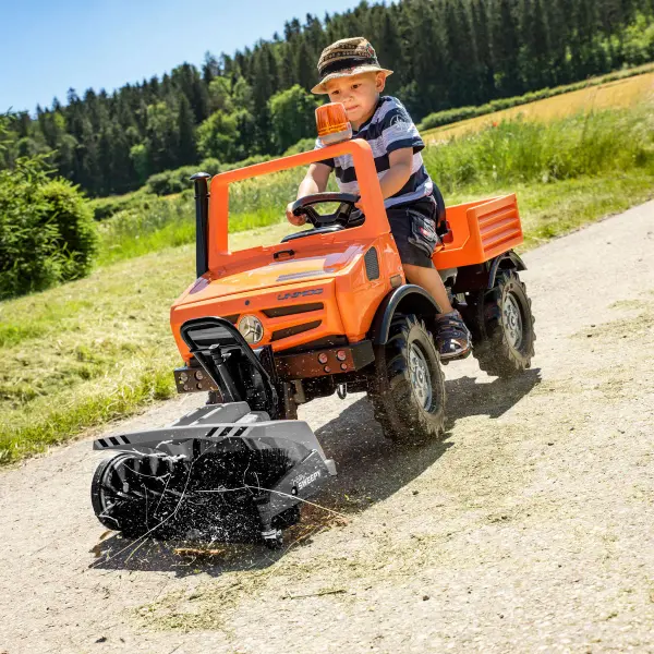 The Mercedes-Unimog Service Truck combines durability with educational play. German engineering ensures quality construction with high-impact resin body, rubber tires, and protected chain drive for ages 4-8. - alternate view