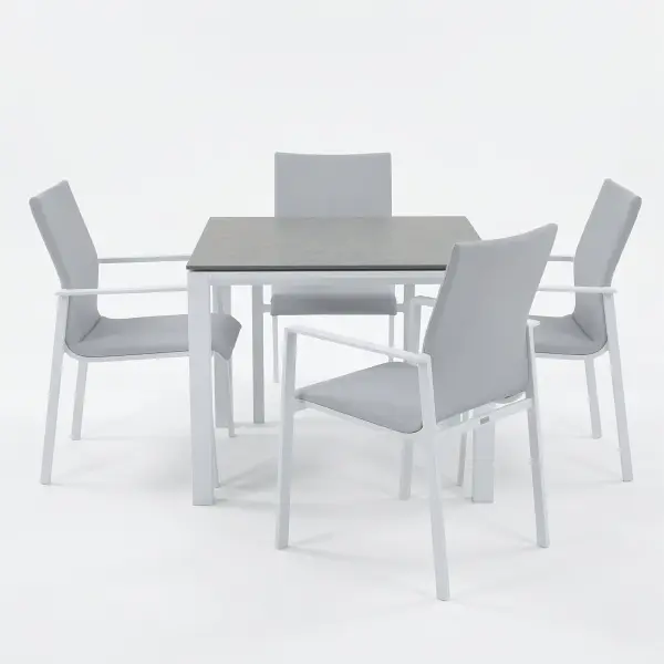 Dine alfresco in style with the Sense Dining Set. The sleek profile of the table and chairs give a clean, contemporary look. The dining chairs feature an aluminum frame with ergonomic arm rests and a comfortable all-weather sling with quick dry foam filling and all weather upholstery fabric. The ceramic top, aluminum frame table is sturdy and weather resistant, ensuring years of outdoor dining enjoyment. Set Includes: (4) Sense Dining Arm Chair (1) 36” Square Concept Dining Table Sense Dining Chair Features: Light-weight powder-coated aluminum construction All-weather soft-touch Textilene fabric cushion for optimal weather resistance and color fastness Padded seat-buckets for maximum comfort and support Durable, all-weather frame and fabric construction Protective, replaceable foot caps prevent marring on any surface and extend the life of the chair No assembly needed Stackable for compact, easy storage Frame color: White Measures: 23"W x 23"D x 34"H, 10lbs Fabric Color: Mouse Grey 36" x 36" Ceramic Dining Table Features: Sturdy powder-coated aluminum construction with stainless steel hardware Maintenance-free ceramic table top is highly scratch-resistant and withstands temperatures ranging from -40°F to 500°F Durable, all-weather frame construction Protective, replaceable foot glides prevent marring on any surface and prolong the life of the table Elegant style lines provide a modern look to any outdoor space Reinforced square frame tubing for added strength Integrated foot levelers prevent wobbling on uneven floors No umbrella hole Minimal assembly needed Measures: 36"L x 36"W x 30"H Frame color: White - alternate view