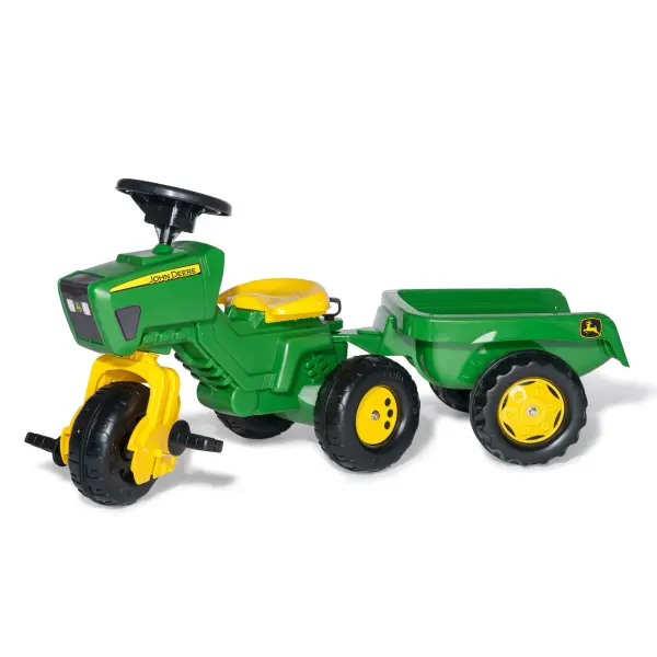 Three-wheeled pedal tractor with tricycle-style riding, electronic steering wheel with horn and engine sounds, and removable hauling trailer. German-engineered with high-impact resin construction and oversized tires.
