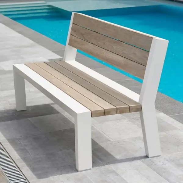 The Java Robust bench pairs powder-coated aluminum with SVLK certified Indonesian teak for a sophisticated outdoor seating solution. Its contemporary white frame and grey teak slats create visual warmth while delivering commercial-grade durability.