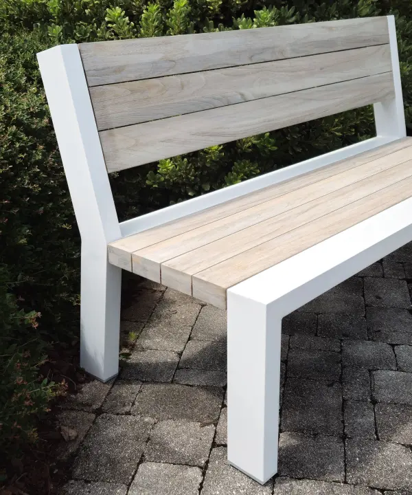 The Java Robust bench pairs powder-coated aluminum with SVLK certified Indonesian teak for a sophisticated outdoor seating solution. Its contemporary white frame and grey teak slats create visual warmth while delivering commercial-grade durability. - alternate view