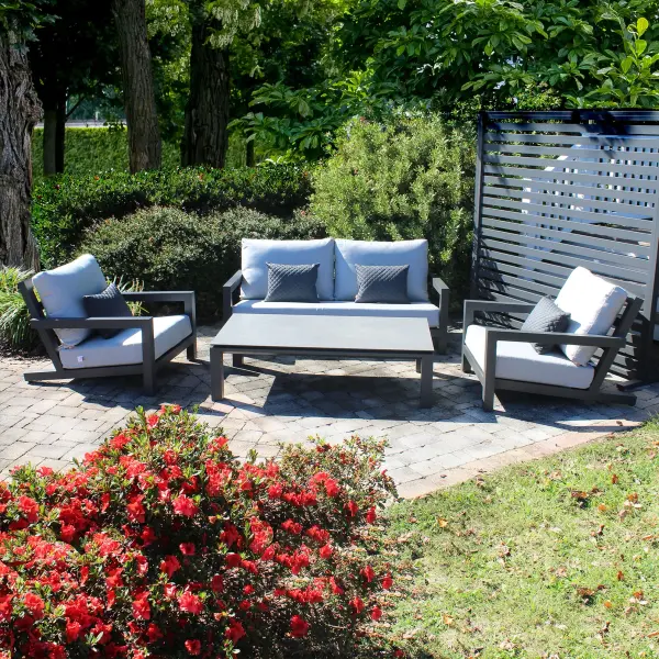 The Block Lounge Set combines contemporary style with exceptional comfort. Featuring powder-coated aluminum frames, quick-drying Textilene sling, and Sunbrella cushions, this set is built for years of outdoor enjoyment.