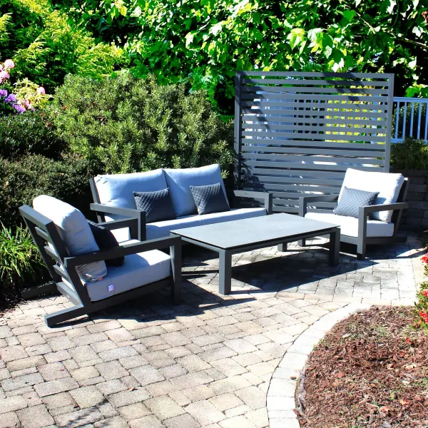 The Block Lounge Set combines contemporary style with exceptional comfort. Featuring powder-coated aluminum frames, quick-drying Textilene sling, and Sunbrella cushions, this set is built for years of outdoor enjoyment. - alternate view