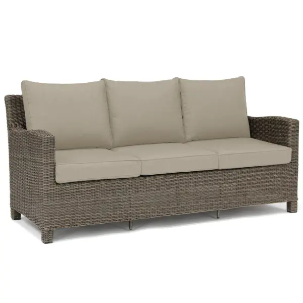 The Palma Wicker Rattan Sofa combines handwoven weatherproof rattan with Sunbrella cushions for exceptional durability. Its aluminum frame and UV-resistant construction make it ideal for both indoor and outdoor use.