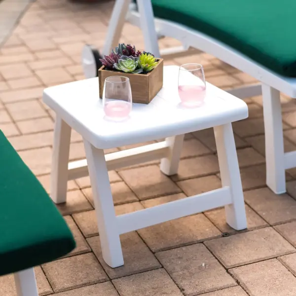The Roma combines eco-friendly construction with German engineering. Made from 100% recycled resin with UV-resistant finish, it serves dual purposes as ottoman or side table with superior drainage for outdoor durability. - alternate view