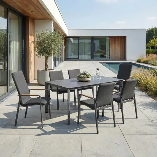 Entertain in effortless style with the DIAMOND 7-Piece Dining Set, including two high-back chairs and four mid-back dining height chairs. Smoothly rounded frames and FSC®-certified teak armrests bring a refined, natural warmth to your space, while the powder-coated aluminum frames and Sunbrella® padded sling seating ensure lasting durability and luxurious comfort. Fade-resistant and low-maintenance, this set lets you enjoy sophisticated outdoor dining with ease and grace. Powder-coated aluminum frame for long-lasting durability FSC®-certified teak armrests add warmth and natural detail Sunbrella® quick-drying padded sling seat and back for outdoor comfort Weather- and fade-resistant materials designed for outdoor use Ergonomic dining-height design with supportive seating Stackable chairs for convenient storage and space efficiency High-pressure laminate 3-layer, one-piece table top resists scratching & chipping Tabletop features an umbrella hole Protective, replaceable table foot glides prevent marring on any surface and extend the life of the table Ideal for residential and commercial outdoor settings Chair Colors: Matte White Frame w/ Natte Linen Fabric or Anthracite Frame w/ Canvas Soot Fabric Table Colors: Matte White w/ Light Rock Top or Anthracite w/ Anthracite Top - alternate view