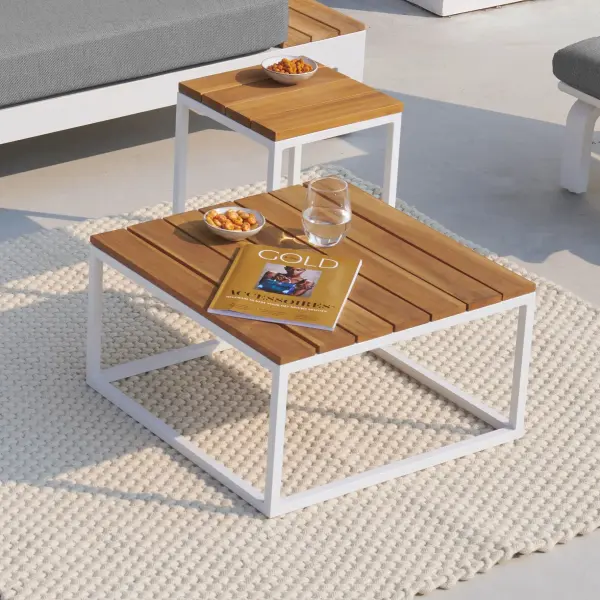 Add more functional dining and entertaining space with the Gili aluminum and FSC Certified teak coffee table and side tables. This versatile collection can accommodate any outdoor space from an intimate balcony area to a more spacious patio or deck. Sturdy Brazilian FSC-certified components Robust teak adds elegance as well as stability Light-weight powder-coated aluminum construction with stainless steel hardware Frame features full circumference welds for added strength Durable, all-weather frame construction Frame Color: White Top Color: Robust Teak - alternate view