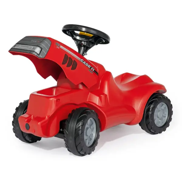 The Case IH Minitrac is a high-quality ride-on toy designed for children 18 months to 4 years. Features include blow-molded resin construction, quiet tires, working horn, and hidden storage under the hood. - alternate view
