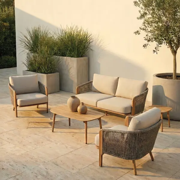The Chelsea Lounge Set creates a warm, inviting space to relax in style, blending the natural look of wood with worry-free durability. Soft, plush cushions in a calming Point Dune tone and textured Sandy Tweed rope add comfort you’ll want to sink into, day after day. Designed for effortless outdoor living, it delivers a refined, modern feel at a price that makes upgrading your space easy. Durable aluminum frame w/ Therma-Luxe heat transfer finish Wood grain look imitating natural wood without the maintenance 100% solution dyed acrylic fabric and olefin rope Plush seat and back cushions for ultimate comfort Ships in one box with minimum assembly Modern upscale look for a fraction of the cost Cushion color: Point Dune Rope color: Sandy Tweed Frame color: Honey Oak Lounge Set Includes: (2) Lounge Chairs (1) Loveseat (1) Coffee Table (1) Side Table (1) Ottoman *Optional* - alternate view