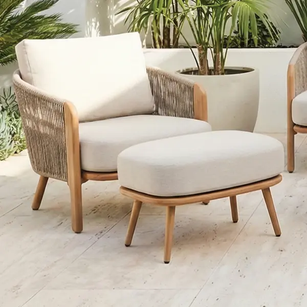The Chelsea Ottoman is the perfect finishing touch to your outdoor lounge space, offering versatile comfort with the same warm, natural aesthetic as the full Chelsea Collection. Designed to pair seamlessly with the lounge chairs or loveseat, it can be used as a footrest, extra seating, or even a casual accent table with a tray. Plush cushioning and a realistic wood-look aluminum frame create an upscale feel without the maintenance of real wood. Durable aluminum frame with Therma-Luxe heat transfer finish Wood grain appearance that mimics natural wood without the upkeep Plush cushion for exceptional comfort and support Multi-functional design for lounging, extra seating, or entertaining Ships fully assembled or with minimal assembly required Modern upscale styling at an approachable price Cushion Color: Point Dune Frame Color: Honey Oak - alternate view