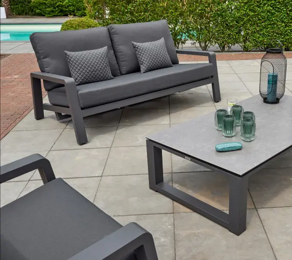 The Boston Select transforms outdoor living with hydraulic reclining on both loveseat and chairs. Powder-coated aluminum construction with stainless steel hardware ensures durability, while independent reclining controls offer personalized comfort. - alternate view