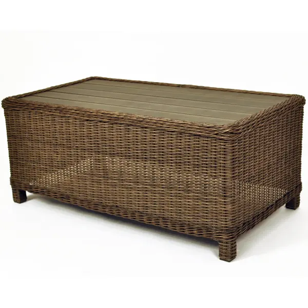 The Palma Wicker Coffee Table combines handwoven weatherproof rattan with a durable aluminum frame, creating a versatile piece that transitions seamlessly between casual dining and relaxed entertaining in outdoor spaces.