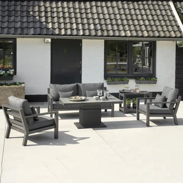 The Timber Lounge Set transforms outdoor living with deep-seating comfort and versatile functionality. Features powder-coated aluminum construction, Sunbrella cushions, and a unique gas-piston adjustable table that converts from lounge to dining height.