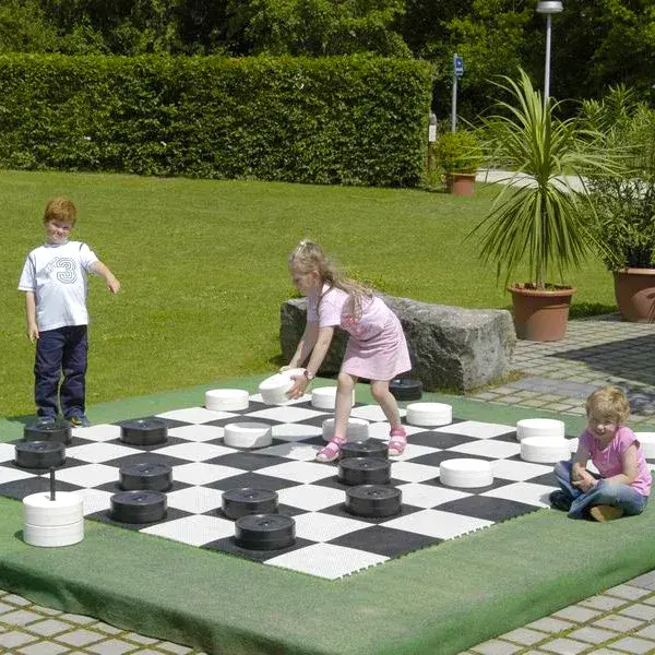 This German-made giant checker set features 24 durable resin pieces (12 white, 12 black) standing over 4 inches tall and 10 inches wide. Perfect for backyards, schools, and resorts with easy stacking storage. - alternate view