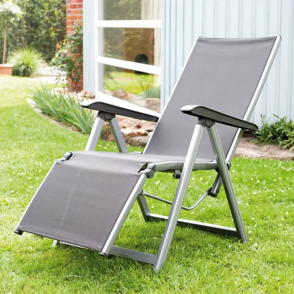 The Basic Plus Relaxer combines lightweight aluminum construction with premium Textilene sling fabric for comfortable outdoor lounging. Features 4-position reclining back and leg rest, folds for compact storage. - alternate view