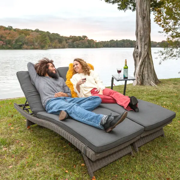 The Palma Wicker Lounger combines handwoven synthetic wicker with a powder-coated aluminum frame for year-round outdoor use. Features multi-position backrest adjustment, UV-resistant materials, and premium Sunbrella cushions. - alternate view