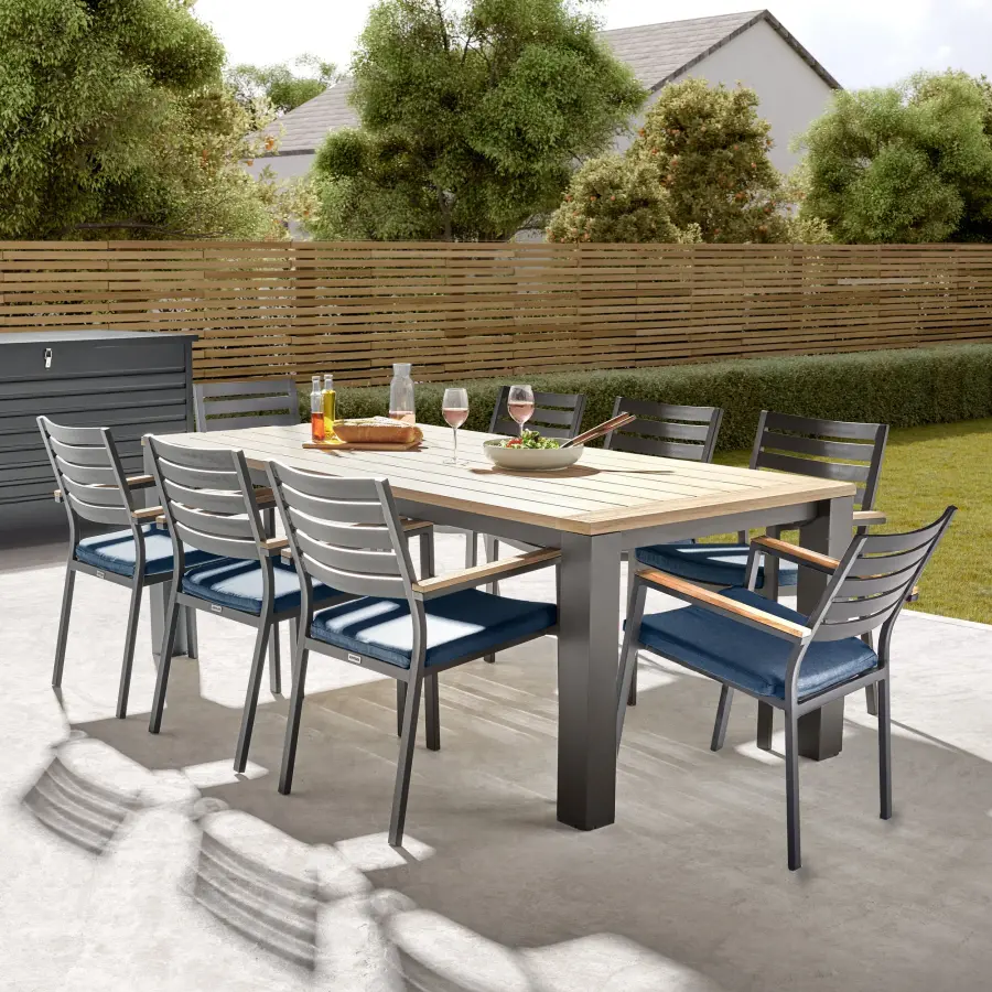 Elba 9-Piece Teak Outdoor Dining Set with Spectrum Indigo Cushions - Image 1
