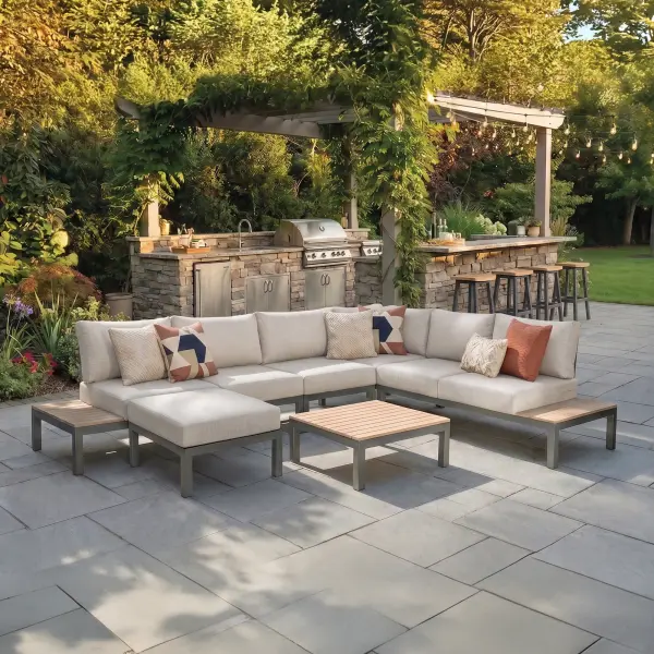 The Elba 6-piece modular set combines sleek charcoal aluminum frames with FSC-certified teak accents and weather-resistant Sunbrella cushions. Configurable design seats up to 5 comfortably for lounging or entertaining outdoors. - alternate view